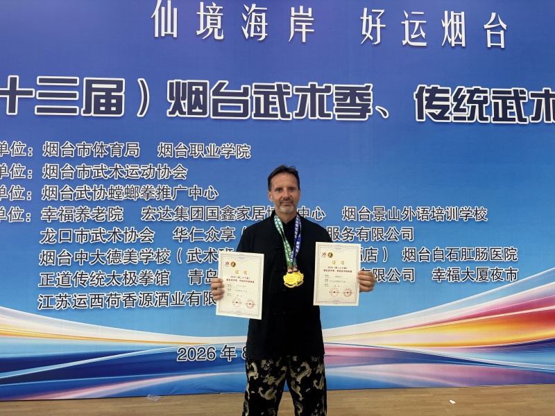 Rafael representing Kunyu Mountain Martial Arts School in the 2026 Kung Fu competition Student Rafael competing for Kunyu Mountain Martial Arts School in a traditional Kung Fu competition in China